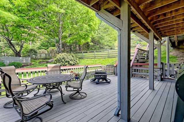 623 Overlook Way, Sky Valley, GA 30537 - wooden deck with stairs, outdoor dining space, and a fenced backyard