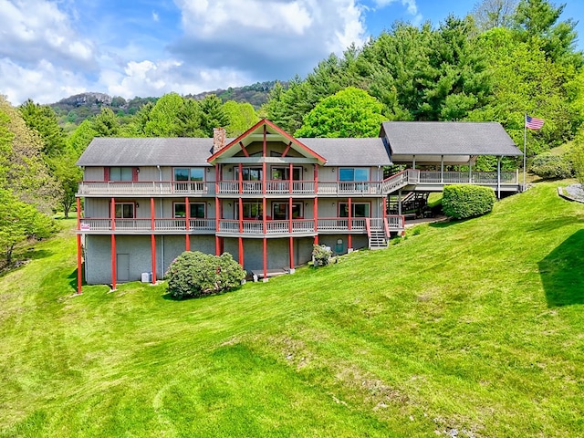 623 Overlook Way, Sky Valley, GA 30537 - back of house featuring a chimney, a lawn, and a deck