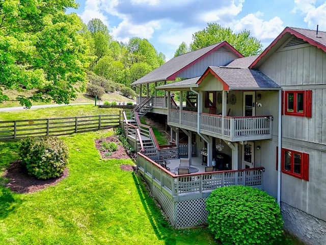 623 Overlook Way, Sky Valley, GA 30537 - back of house with a yard, stairs, a deck, roof with shingles, and a fenced backyard