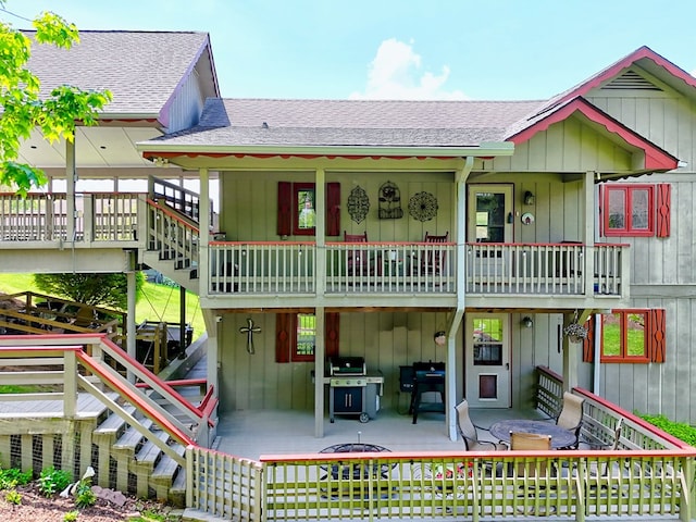 623 Overlook Way, Sky Valley, GA 30537 - rear view of property featuring roof with shingles, stairs, and a patio