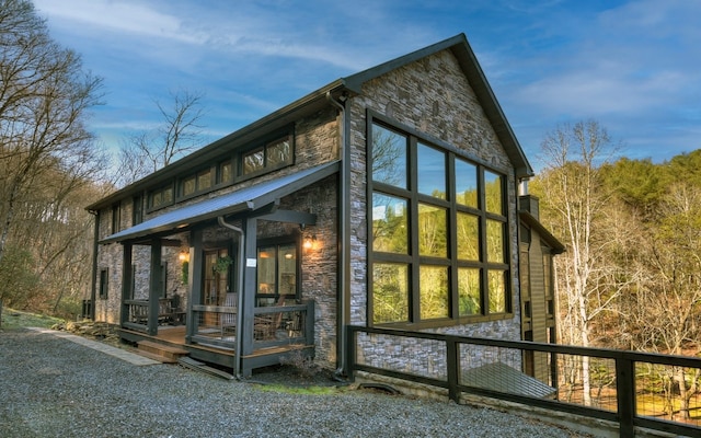 view of home's exterior with stone siding