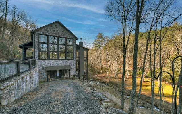 view of home's exterior with stone siding
