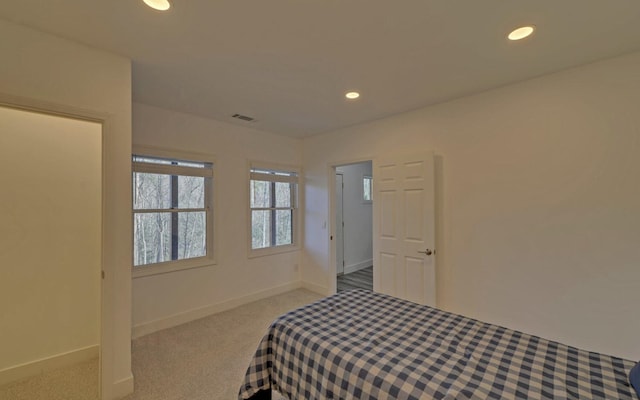 bedroom with baseboards, carpet flooring, visible vents, and recessed lighting