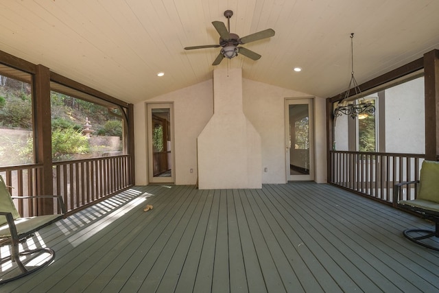wooden terrace featuring a ceiling fan