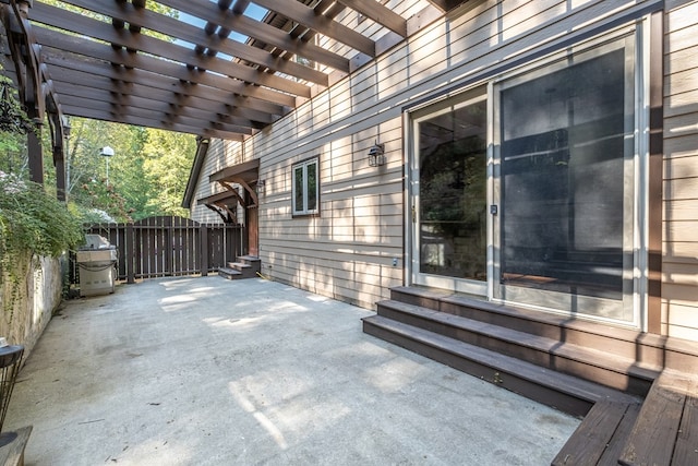 view of patio featuring entry steps and a pergola