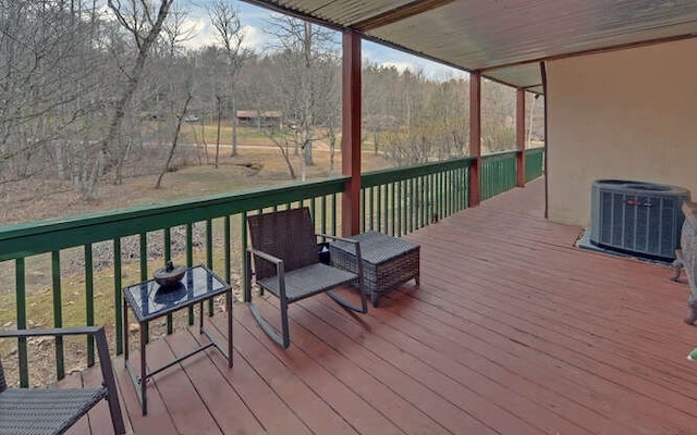 wooden deck with central AC unit