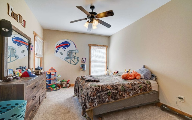 carpeted bedroom featuring ceiling fan