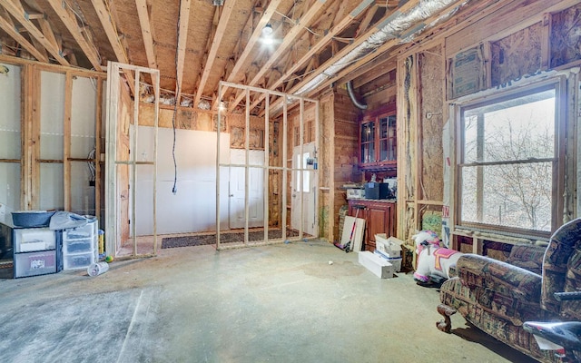 miscellaneous room with concrete flooring