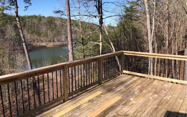 deck featuring a water view