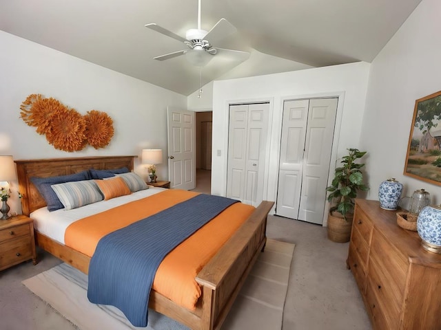 3273 Ivy Log Rd, Blairsville, GA 30512 - bedroom featuring multiple closets, lofted ceiling, carpet floors, and a ceiling fan