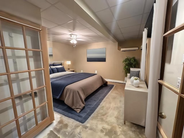 3273 Ivy Log Rd, Blairsville, GA 30512 - bedroom featuring a drop ceiling, concrete flooring, and baseboards