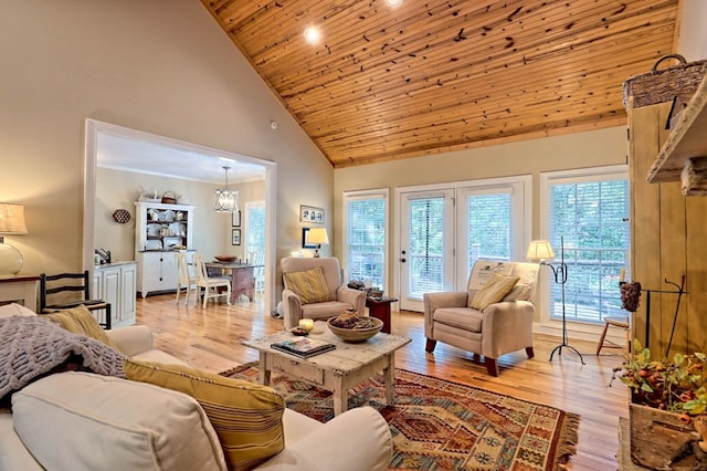 living room featuring light hardwood / wood-style flooring, high vaulted ceiling, wooden ceiling, and a wealth of natural light