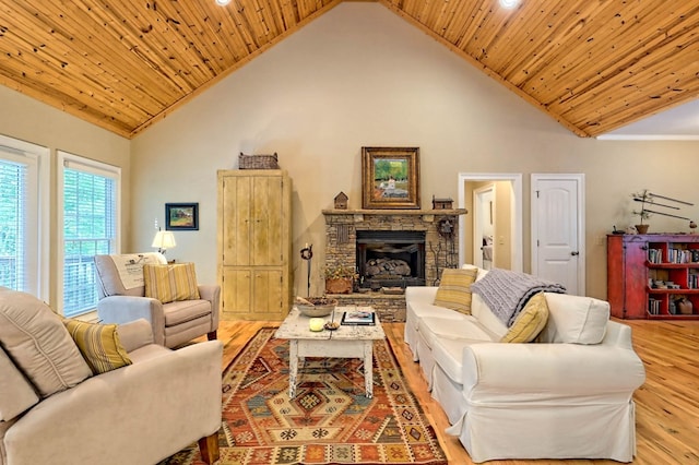 living room featuring wood ceiling, high vaulted ceiling, and light wood-type flooring