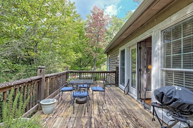 10 Quiet Place Ln, Clayton, GA 30525 - wooden deck featuring outdoor dining area and a grill