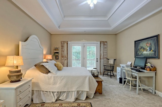 carpeted bedroom featuring ceiling fan, a raised ceiling, access to outside, and crown molding