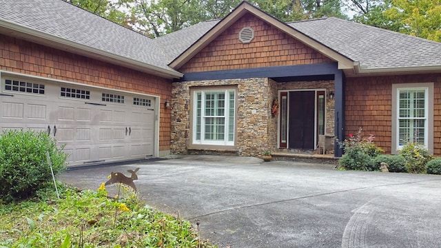 view of front of home with a garage