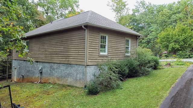 10 Quiet Place Ln, Clayton, GA 30525 - view of side of property featuring a lawn and a shingled roof
