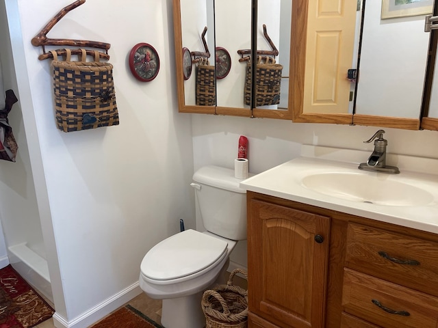 352 Partridge Ln, Murphy, NC 28906 - full bathroom featuring vanity, toilet, and baseboards