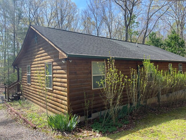 352 Partridge Ln, Murphy, NC 28906 - view of home's exterior featuring a shingled roof and log veneer siding