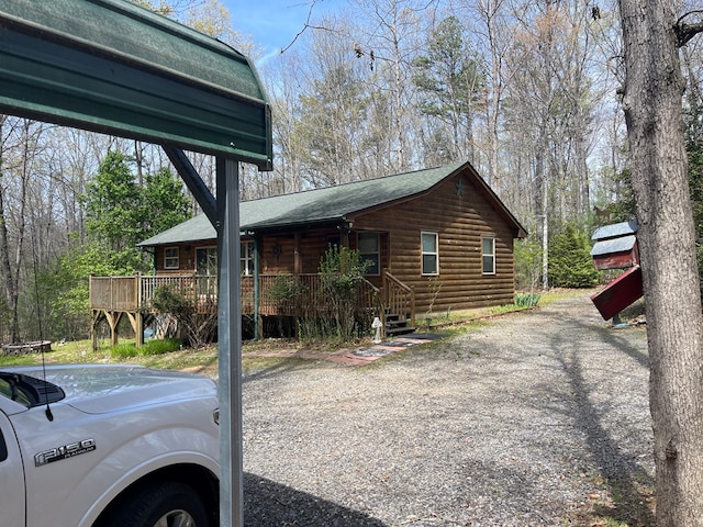 352 Partridge Ln, Murphy, NC 28906 - view of property exterior with a porch and roof with shingles
