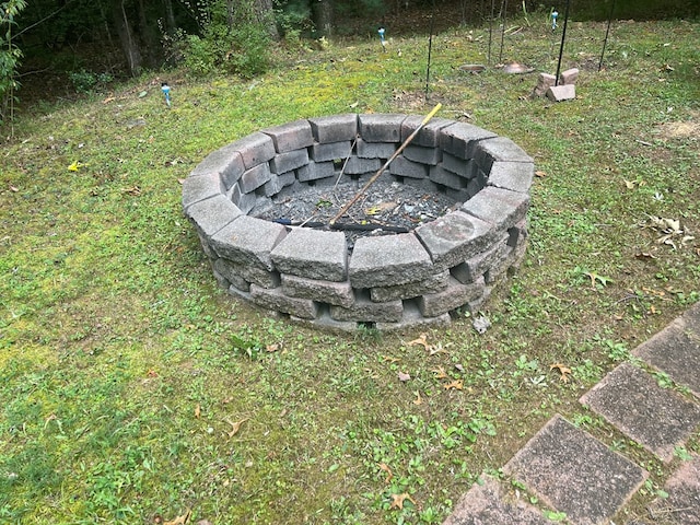 exterior details with a fire pit