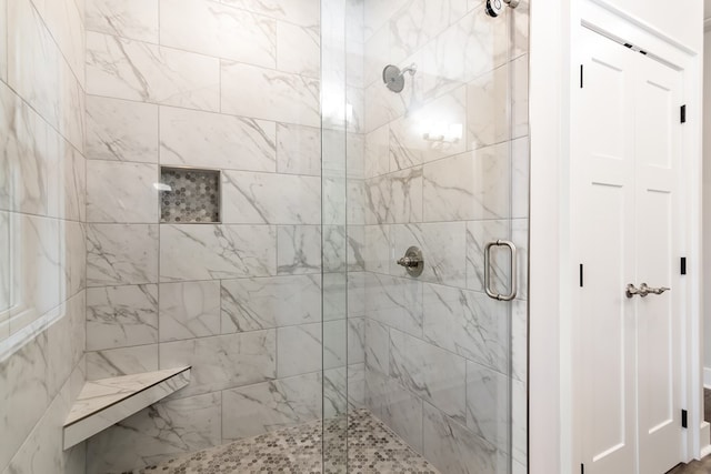 bathroom with an enclosed shower