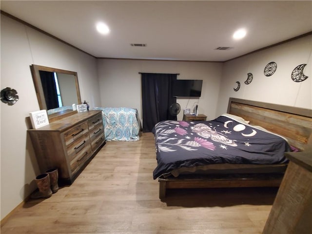 bedroom with light hardwood / wood-style flooring