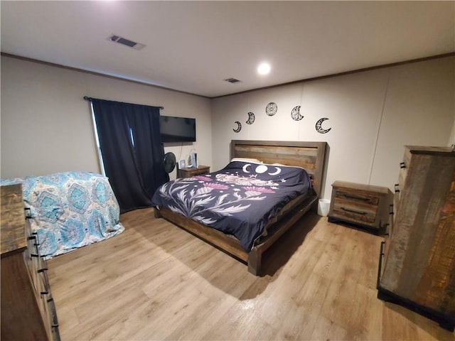 bedroom featuring light hardwood / wood-style flooring