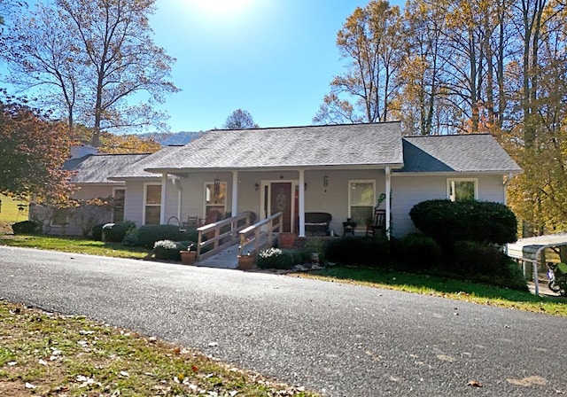 ranch-style home with a porch