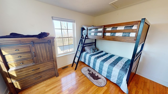 bedroom with light hardwood / wood-style floors