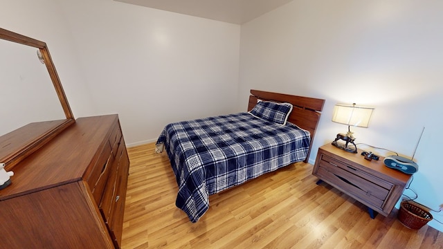 bedroom featuring light hardwood / wood-style flooring