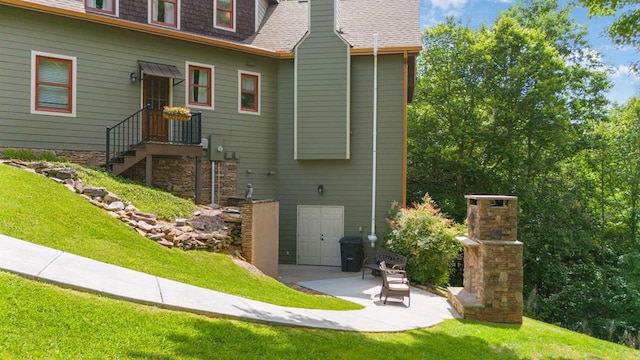41 Elm Ct, Murphy, NC 28906 - rear view of house with a lawn, a patio, and roof with shingles