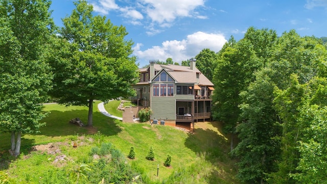 41 Elm Ct, Murphy, NC 28906 - rear view of property with a sunroom, a yard, a wooden deck, and a chimney