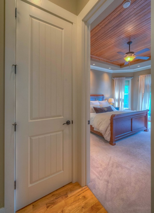 41 Elm Ct, Murphy, NC 28906 - bedroom with wood ceiling, a tray ceiling, light wood-style floors, and crown molding