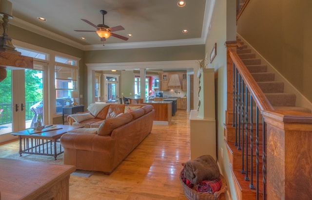 41 Elm Ct, Murphy, NC 28906 - living room featuring french doors, healthy amount of natural light, light wood-style flooring, a ceiling fan, and ornamental molding