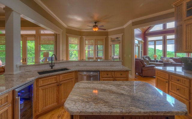 41 Elm Ct, Murphy, NC 28906 - kitchen featuring beverage cooler, stainless steel dishwasher, open floor plan, healthy amount of natural light, and ornamental molding