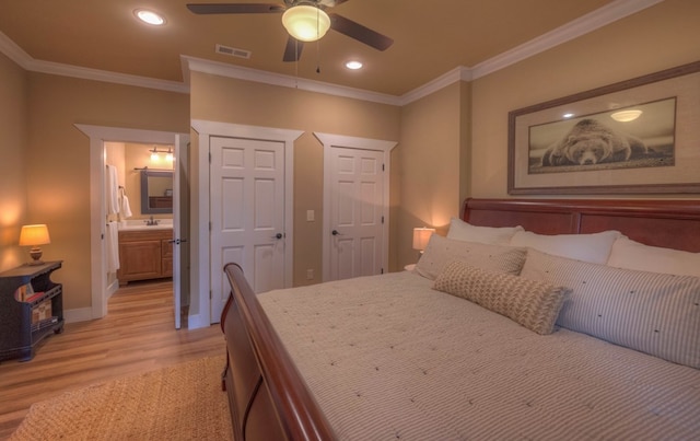 41 Elm Ct, Murphy, NC 28906 - bedroom with light wood-type flooring, ornamental molding, recessed lighting, connected bathroom, and ceiling fan