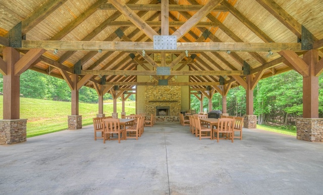41 Elm Ct, Murphy, NC 28906 - view of patio featuring an outdoor stone fireplace, a gazebo, and outdoor dining area