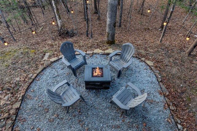 318 Buck Ridge Rd, Suches, GA 30572 - view of patio featuring an outdoor fire pit