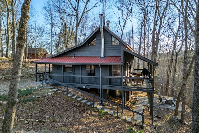 318 Buck Ridge Rd, Suches, GA 30572 - exterior space featuring metal roof, covered porch, and stairway