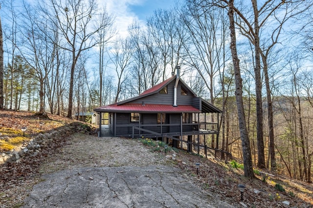 318 Buck Ridge Rd, Suches, GA 30572 - view of front of property with a chimney, covered porch, and metal roof