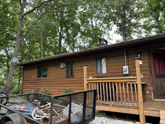 view of home's exterior featuring a deck