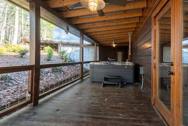 unfurnished sunroom with lofted ceiling