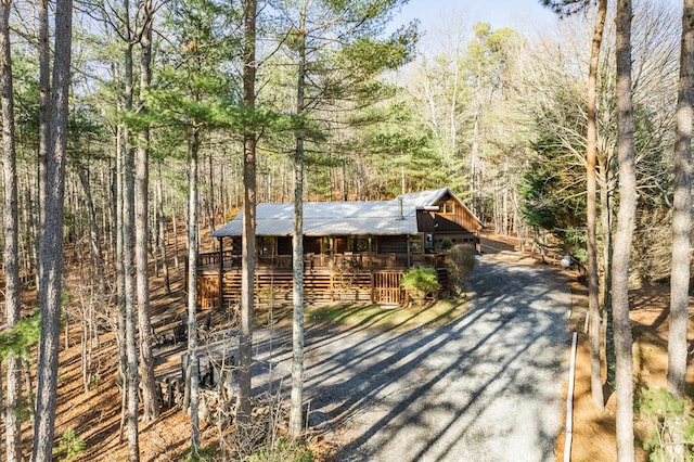 view of front of property with a wooden deck