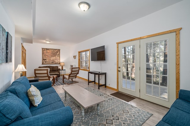 living room with light hardwood / wood-style flooring