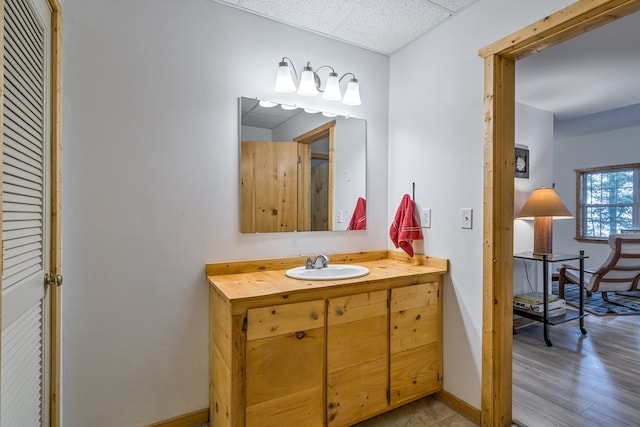 bathroom featuring vanity and hardwood / wood-style flooring