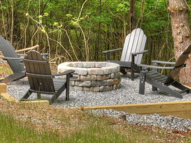 view of patio with a fire pit