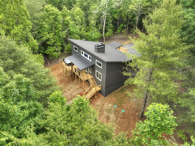 aerial view featuring a forest view