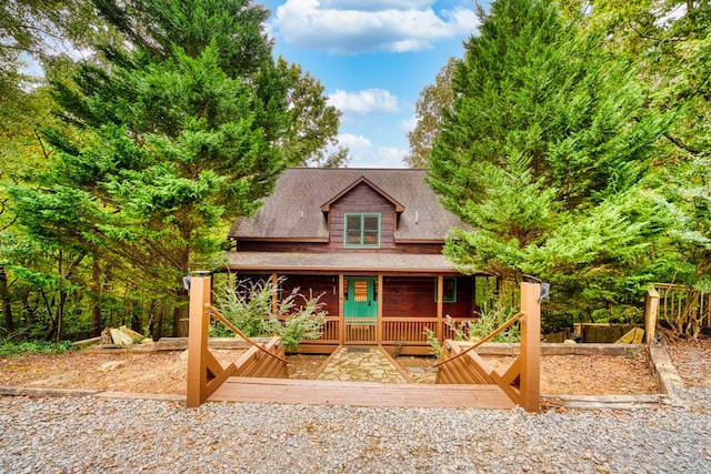 view of front of property featuring a wooden deck