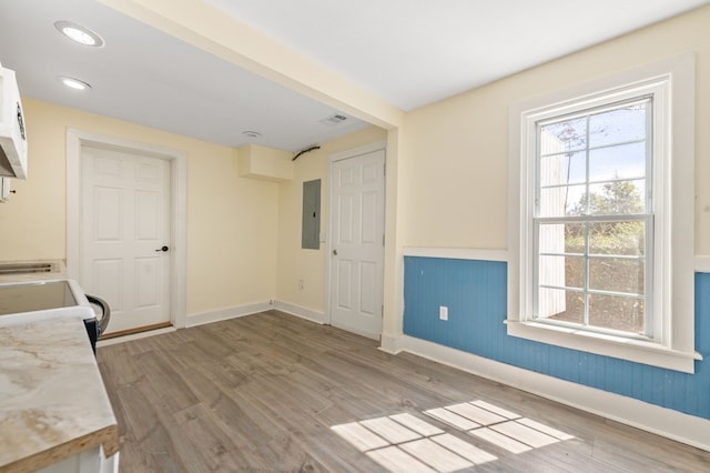 interior space featuring hardwood / wood-style flooring and electric panel